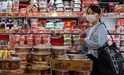 Japan raises interest rate to highest since 1995